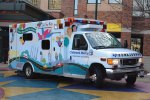 Paediatric ambulance with mural larking layout